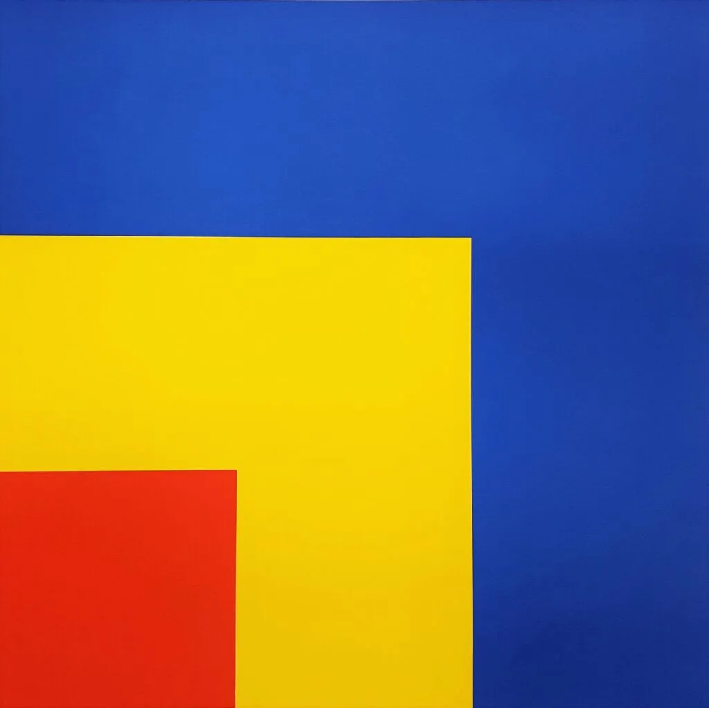 A flat colour painting of overlapping rectangles: a large blue field, a yellow block across the lower left and a red block in the bottom left corner.